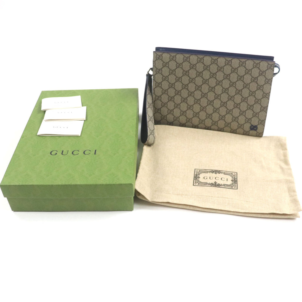 Gucci GG Supreme Canvas Clutch Bag