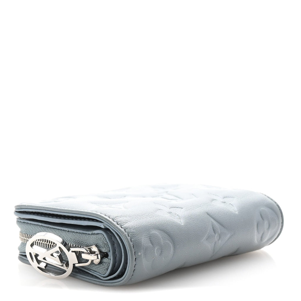 Lambskin Embossed Monogram Lou Coussin Wallet Blue Glacier