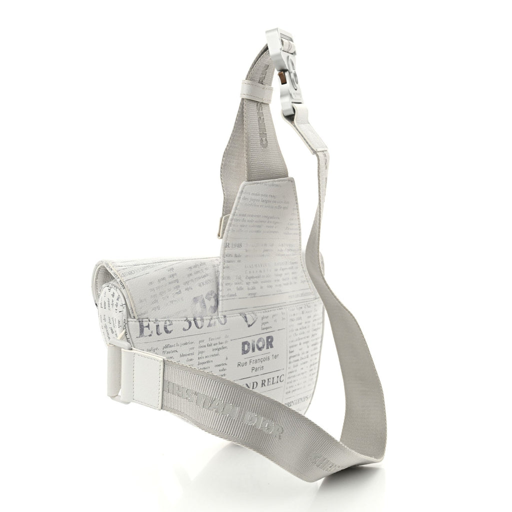 X DANIEL ARSHAM Grained Calfskin Newspaper Print Saddle Bag White