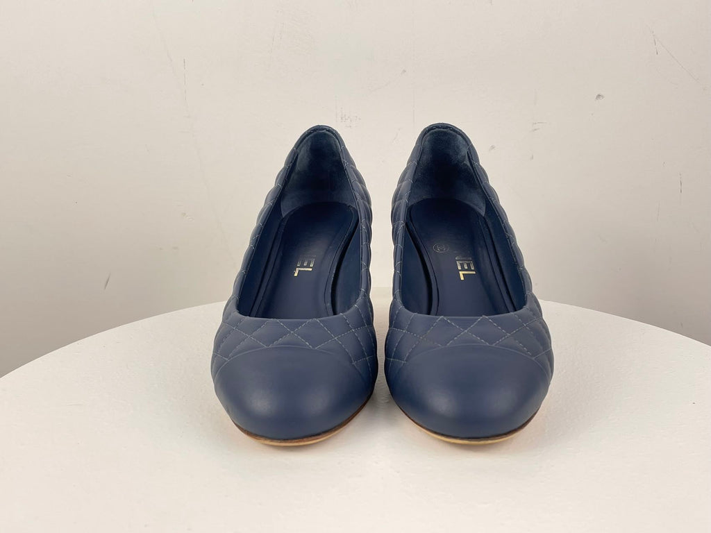 Chanel Navy Black Calfskin Quilted Cap Toe Camellia Pumps 37.5 with Cc Logo