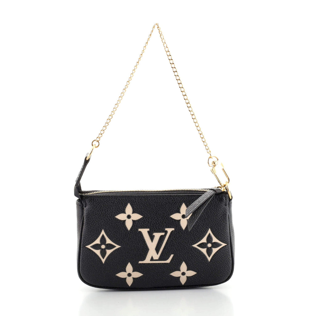 Pochette Accessoires Bicolor Monogram Empreinte Giant Mini