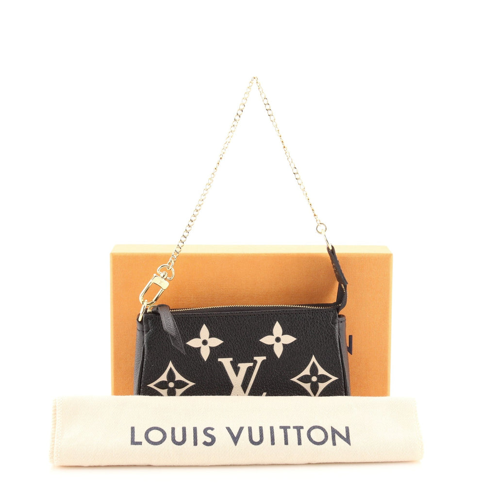 Pochette Accessoires Bicolor Monogram Empreinte Giant Mini