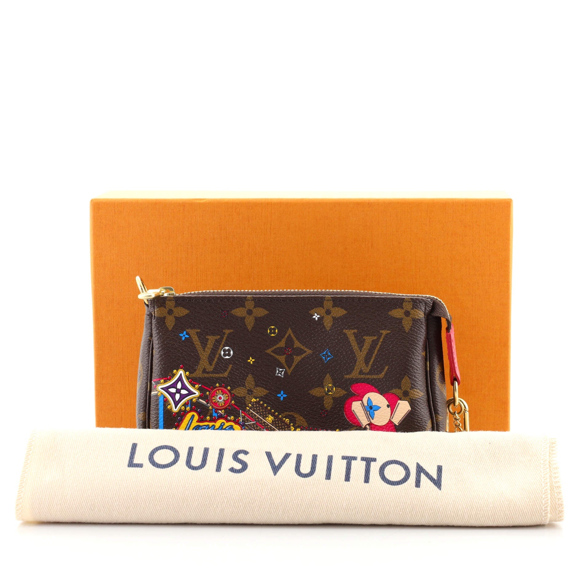 Pochette Accessoires Limited Edition Vivienne Xmas Monogram Canvas Mini