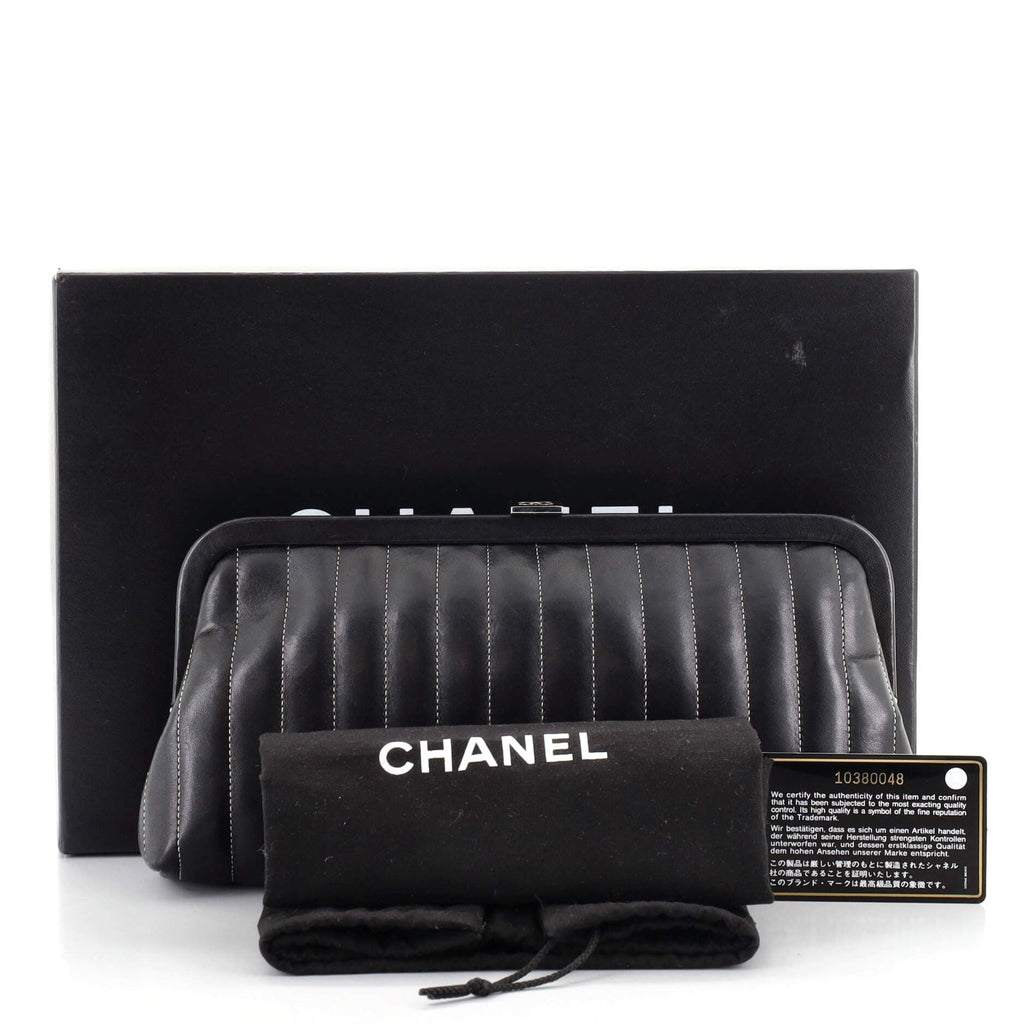 Mademoiselle Clutch Vertical Quilted Lambskin
