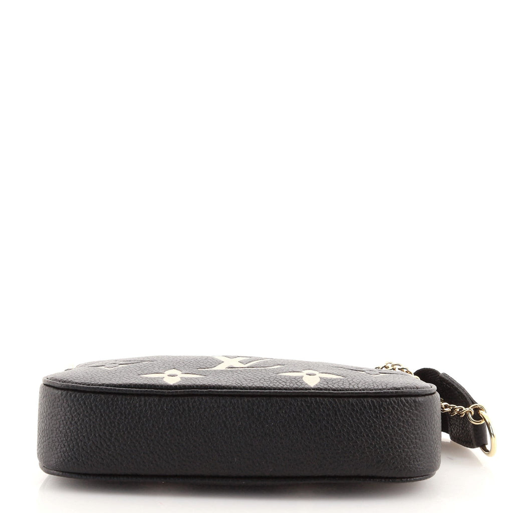 Pochette Accessoires Bicolor Monogram Empreinte Giant Mini