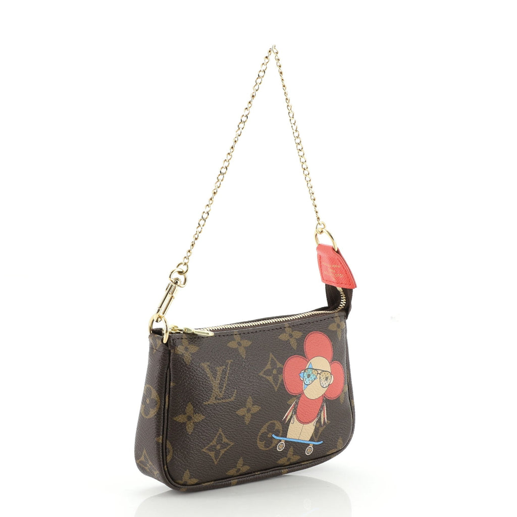 Pochette Accessoires Limited Edition Vivienne Xmas Monogram Canvas Mini