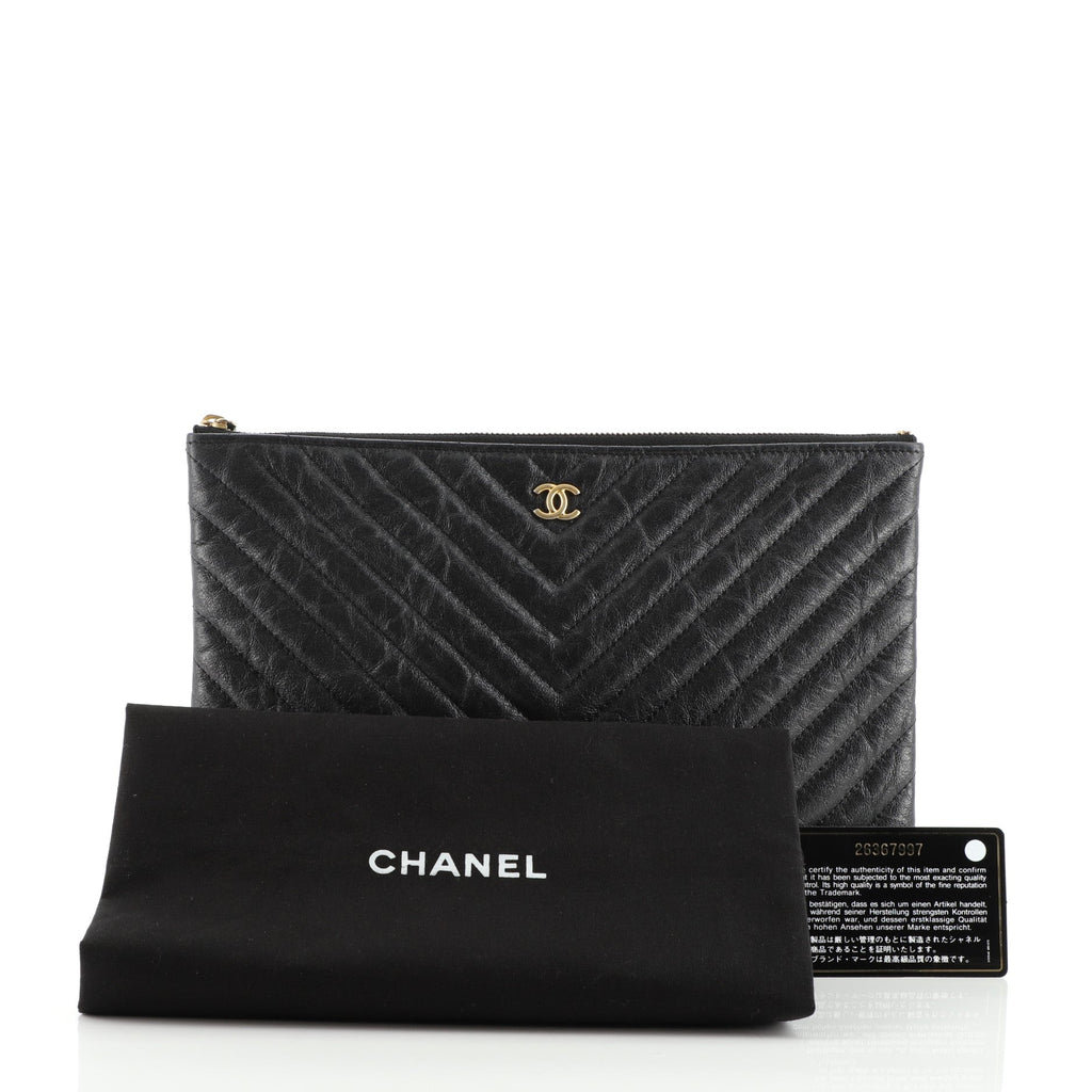 O Case Clutch Chevron Aged Calfskin Medium