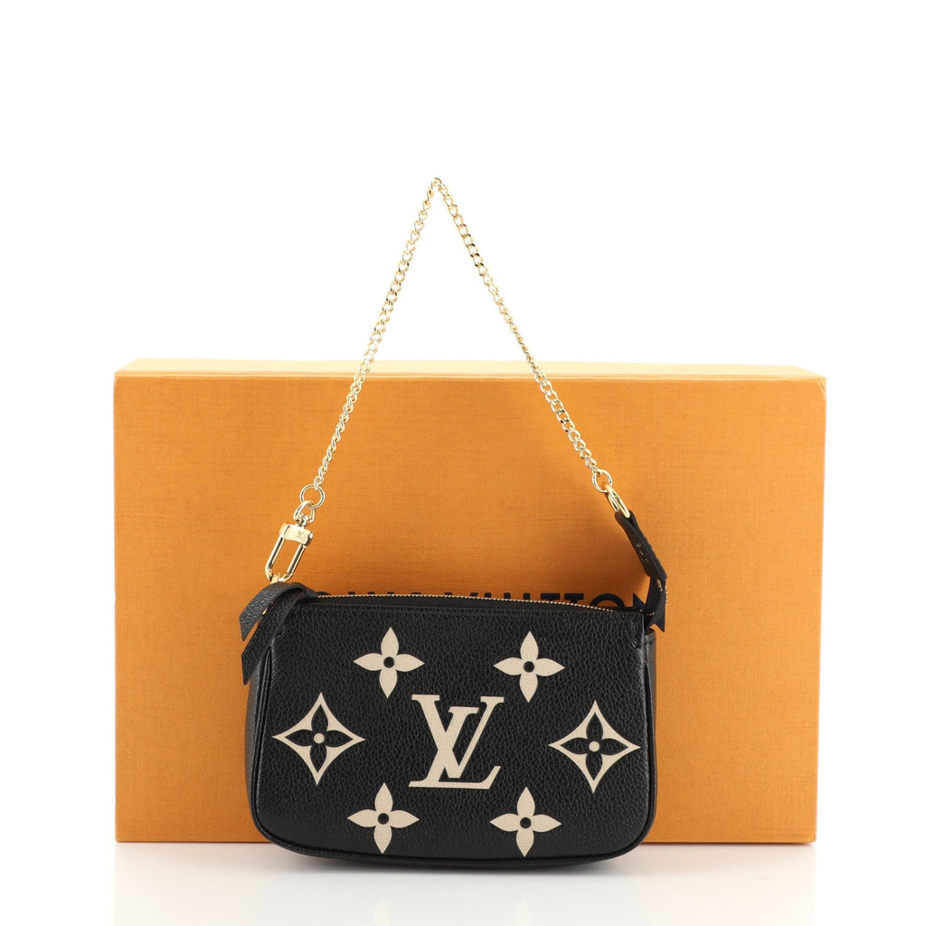 Pochette Accessoires Bicolor Monogram Empreinte Giant Mini