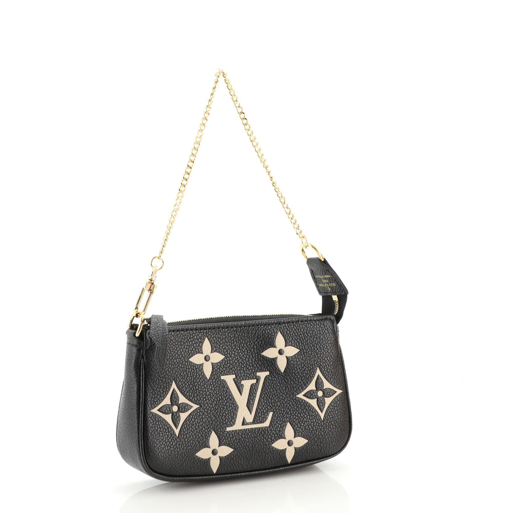 Pochette Accessoires Bicolor Monogram Empreinte Giant Mini
