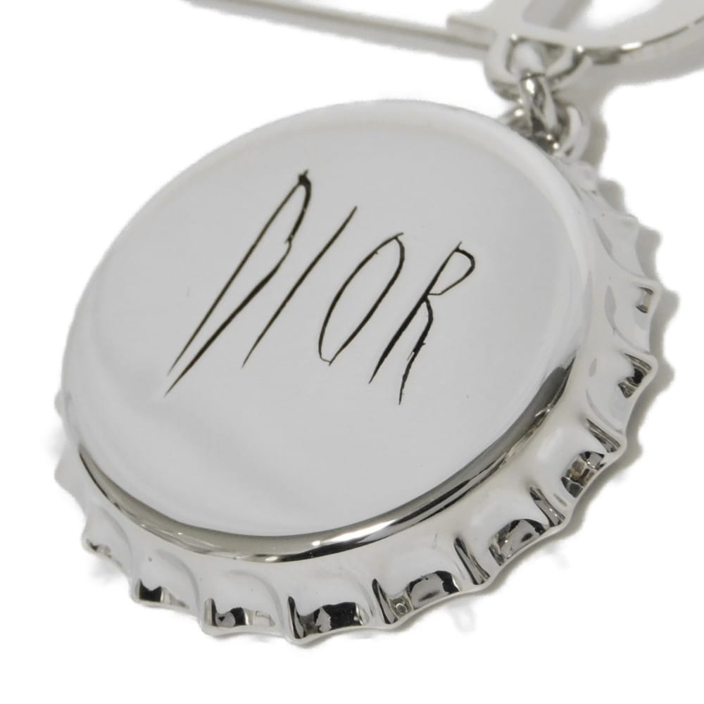 Dior Logo Bottle Cap Brooch