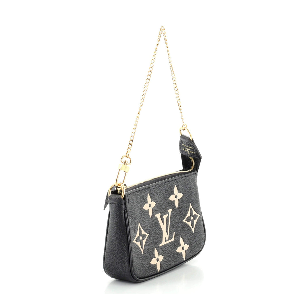 Pochette Accessoires Bicolor Monogram Empreinte Giant Mini