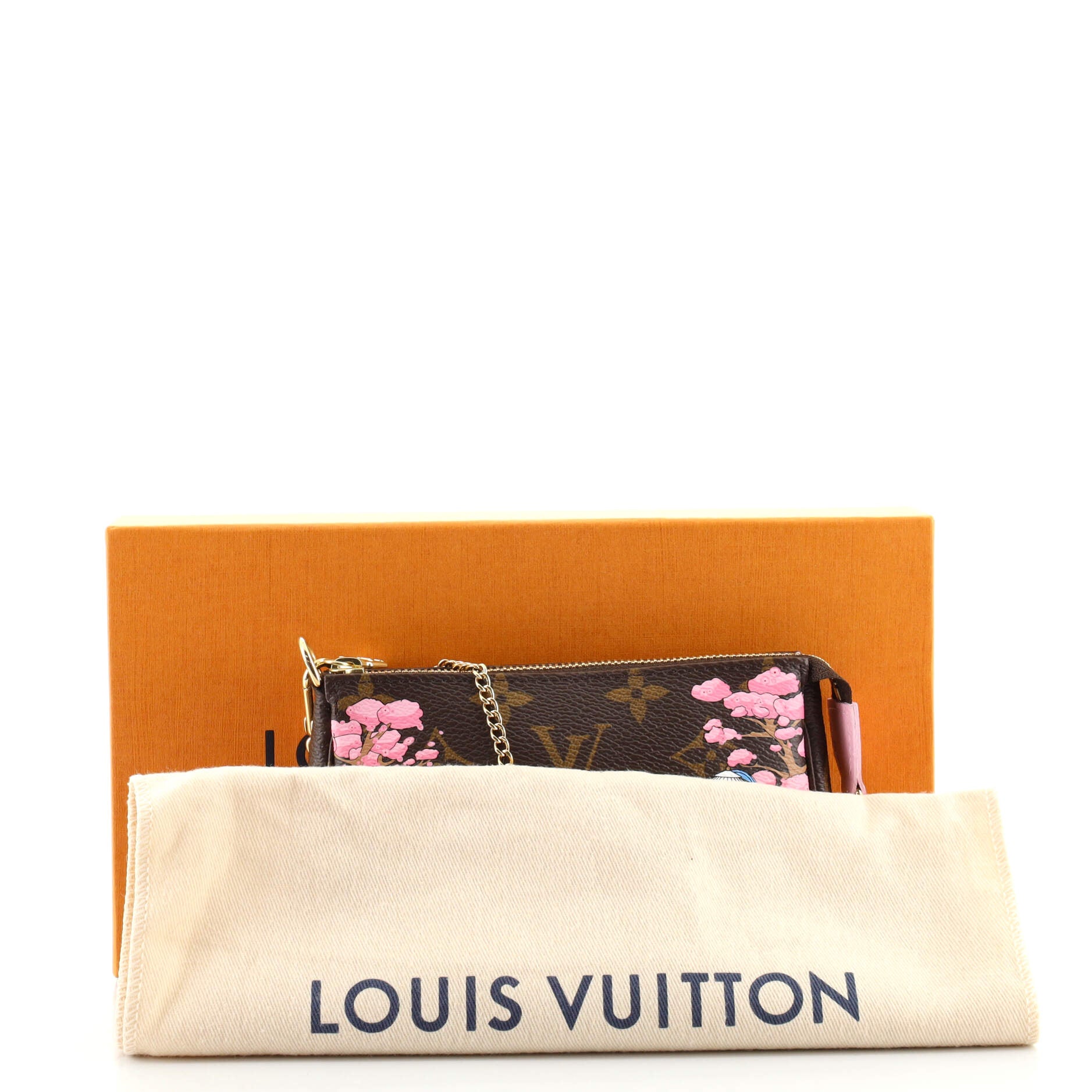 Pochette Accessoires Limited Edition Vivienne Xmas Monogram Canvas Mini