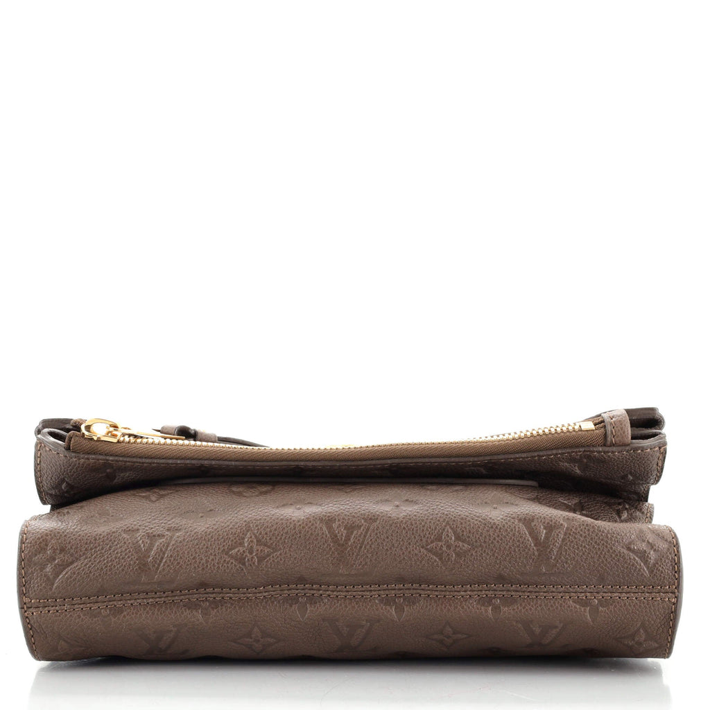 Petillante Clutch Monogram Empreinte Leather