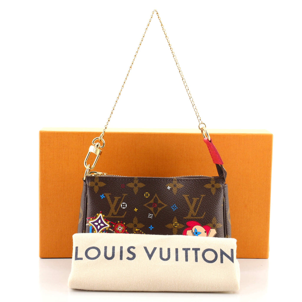 Pochette Accessoires Limited Edition Vivienne Xmas Monogram Canvas Mini
