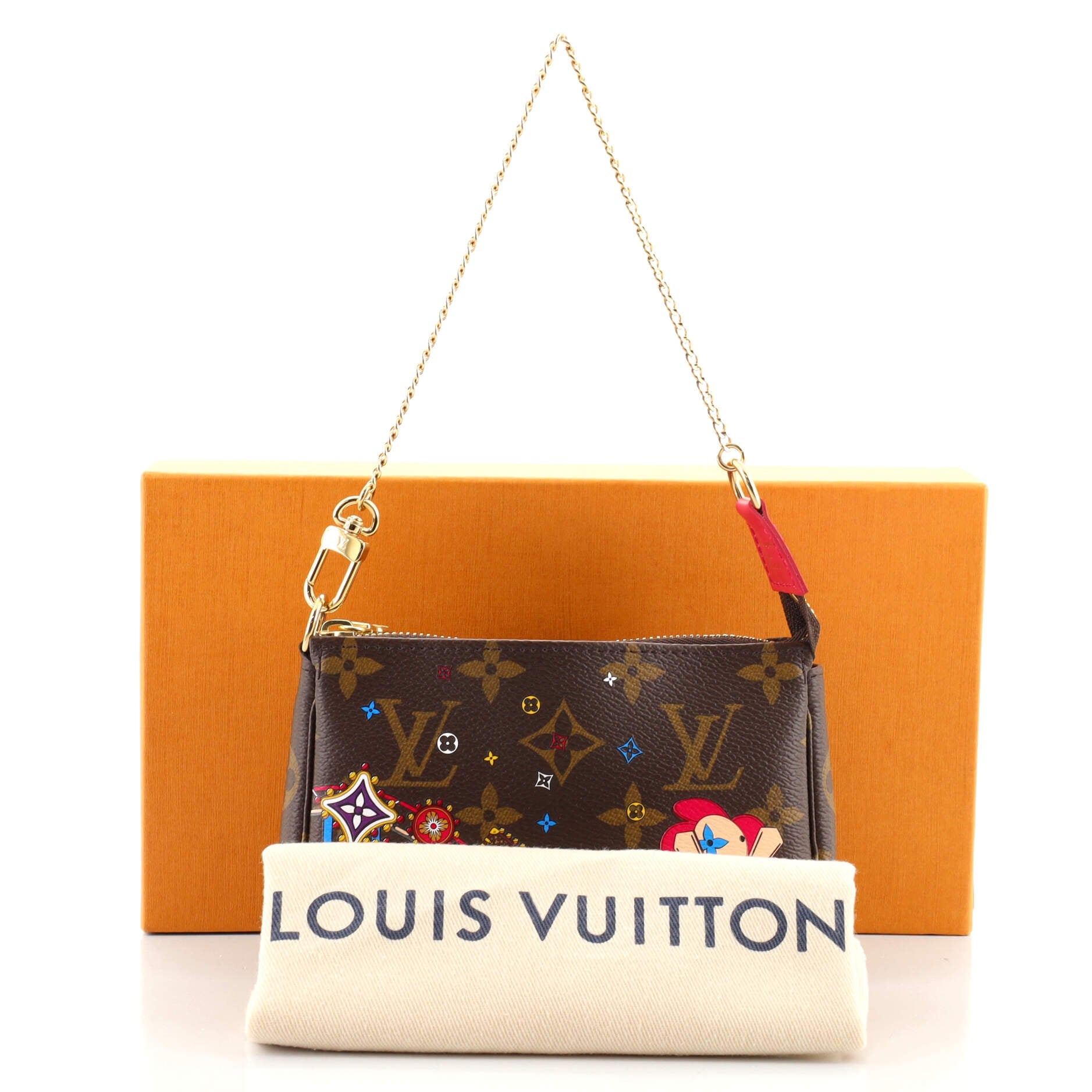 Pochette Accessoires Limited Edition Vivienne Xmas Monogram Canvas Mini