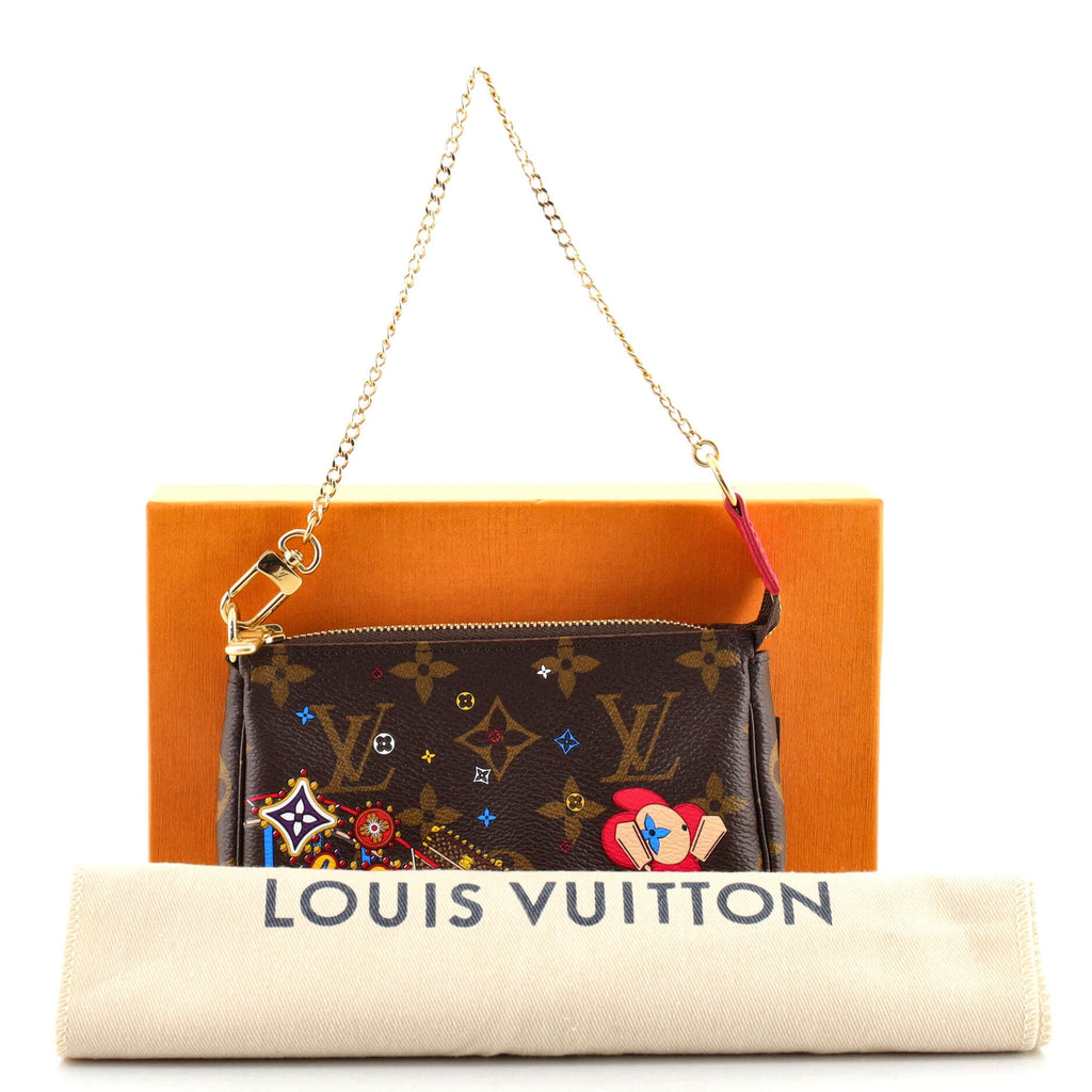 Pochette Accessoires Limited Edition Vivienne Xmas Monogram Canvas Mini
