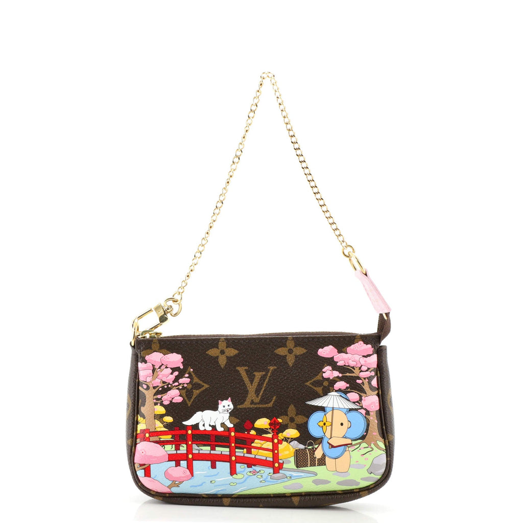 Pochette Accessoires Limited Edition Vivienne Xmas Monogram Canvas Mini