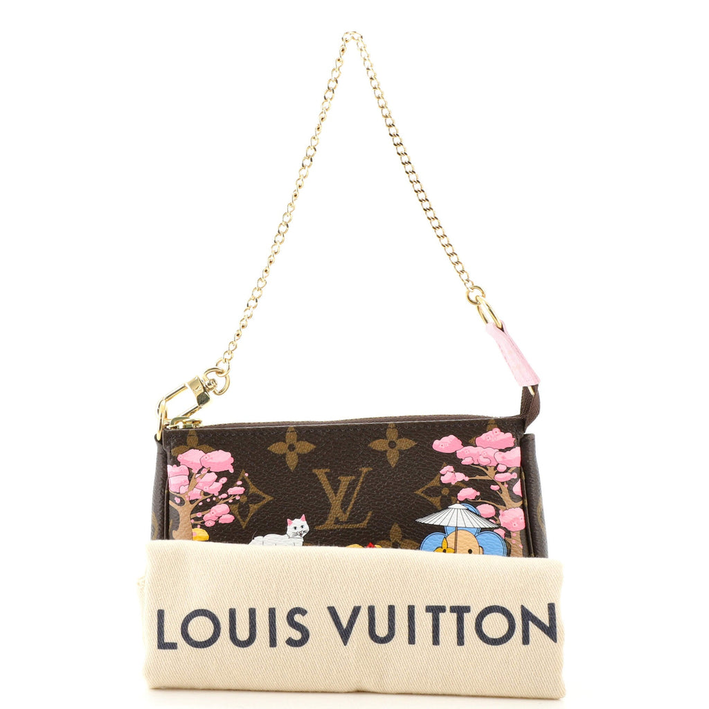 Pochette Accessoires Limited Edition Vivienne Xmas Monogram Canvas Mini