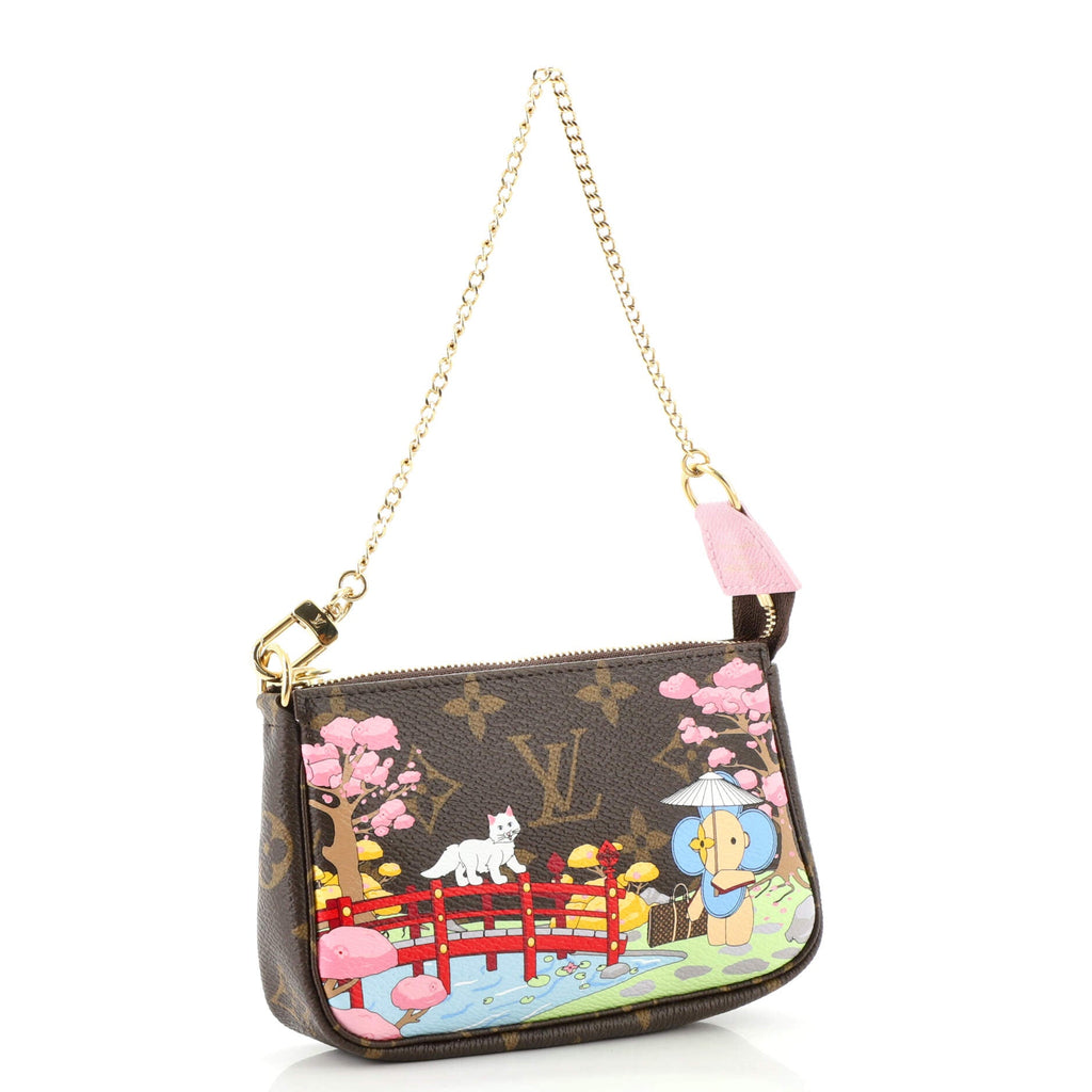 Pochette Accessoires Limited Edition Vivienne Xmas Monogram Canvas Mini
