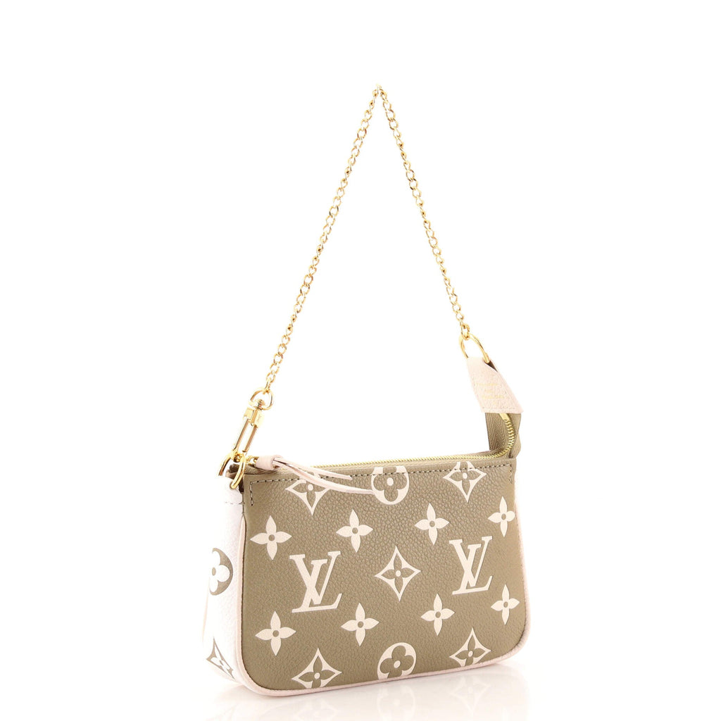 Pochette Accessoires Spring in the City Monogram Empreinte Leather Mini