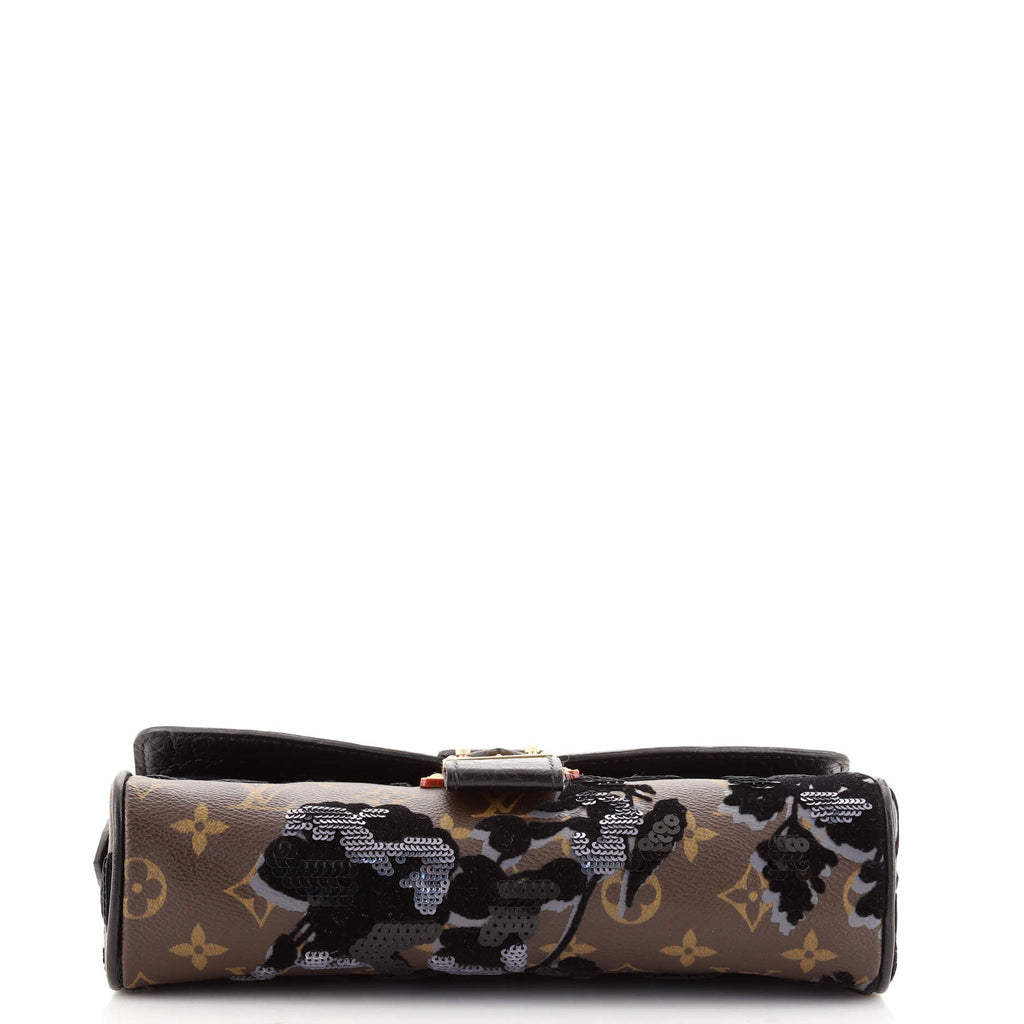 Manege Clutch Fleur De Jais Monogram Canvas