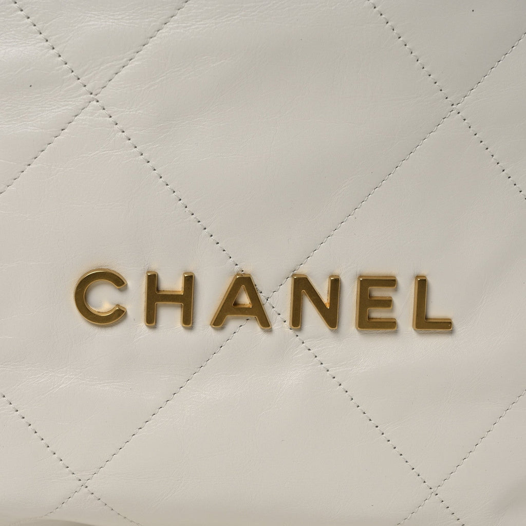 Shiny Calfskin Quilted Chanel 22 Backpack White