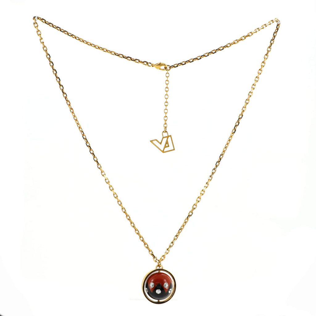 Spinning Sphere Pendant Necklace Metal and Crystal Embellished Resin