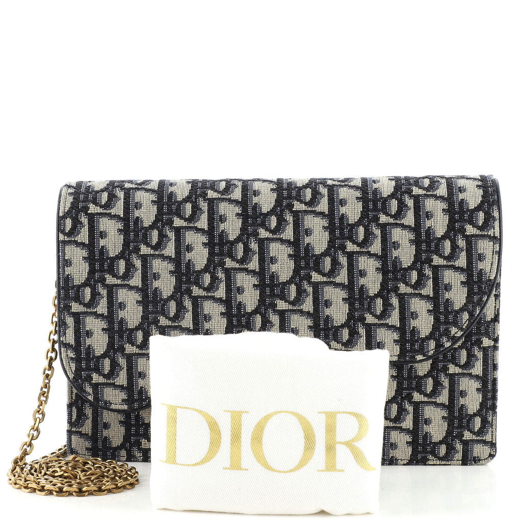 Saddle Chain Clutch Oblique Canvas