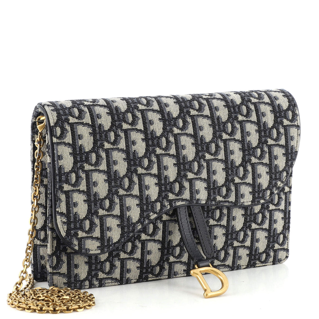 Saddle Chain Clutch Oblique Canvas