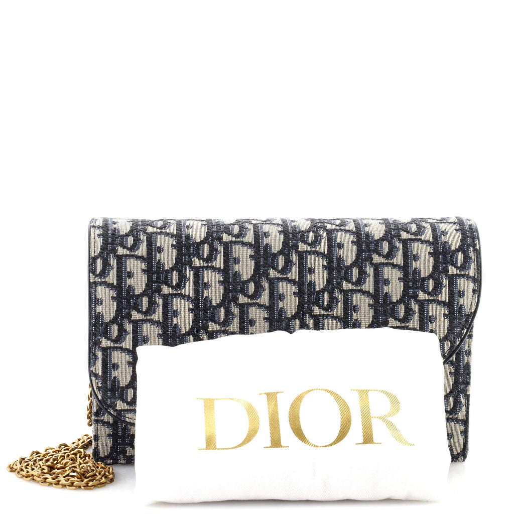 Saddle Chain Clutch Oblique Canvas