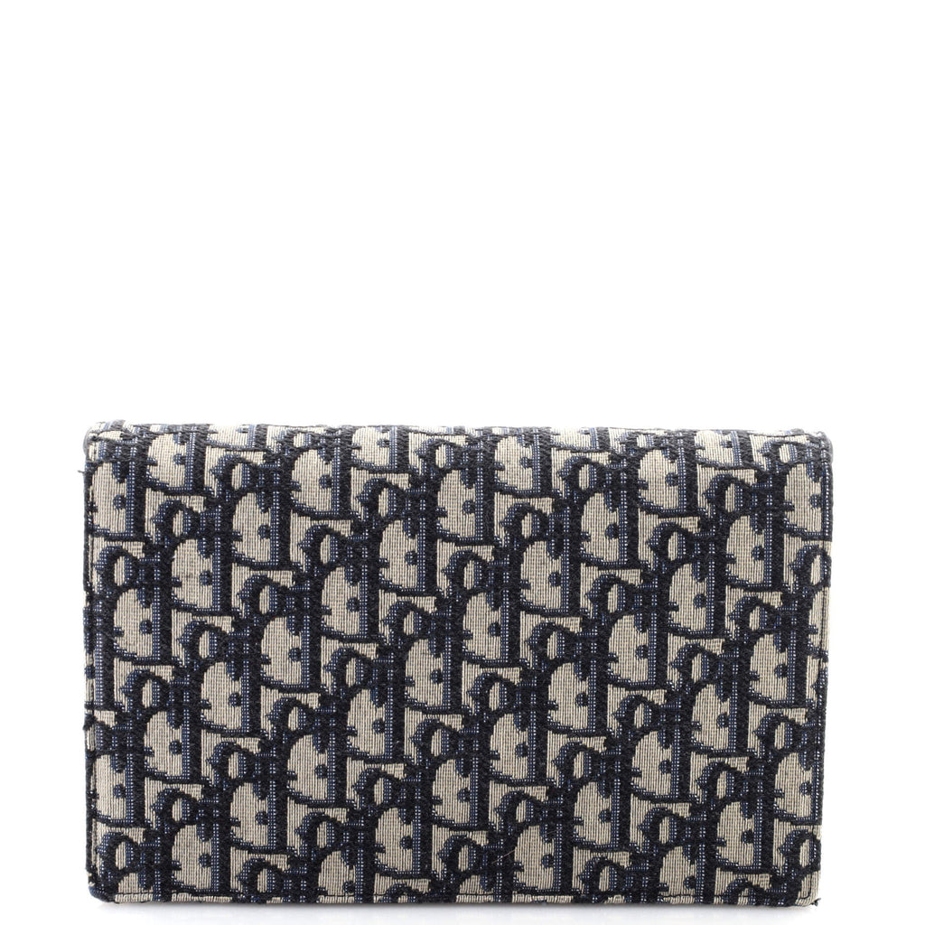 Saddle Chain Clutch Oblique Canvas
