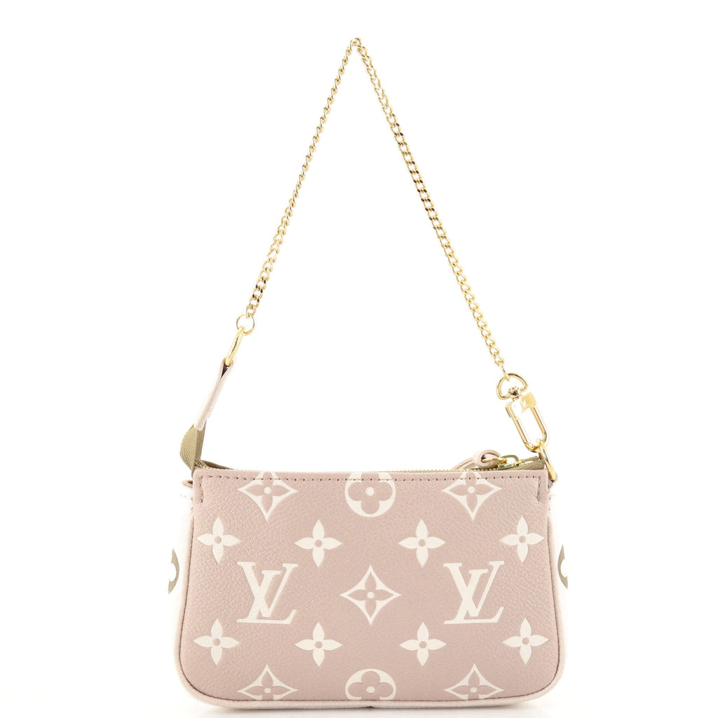 Pochette Accessoires Spring in the City Monogram Empreinte Leather Mini