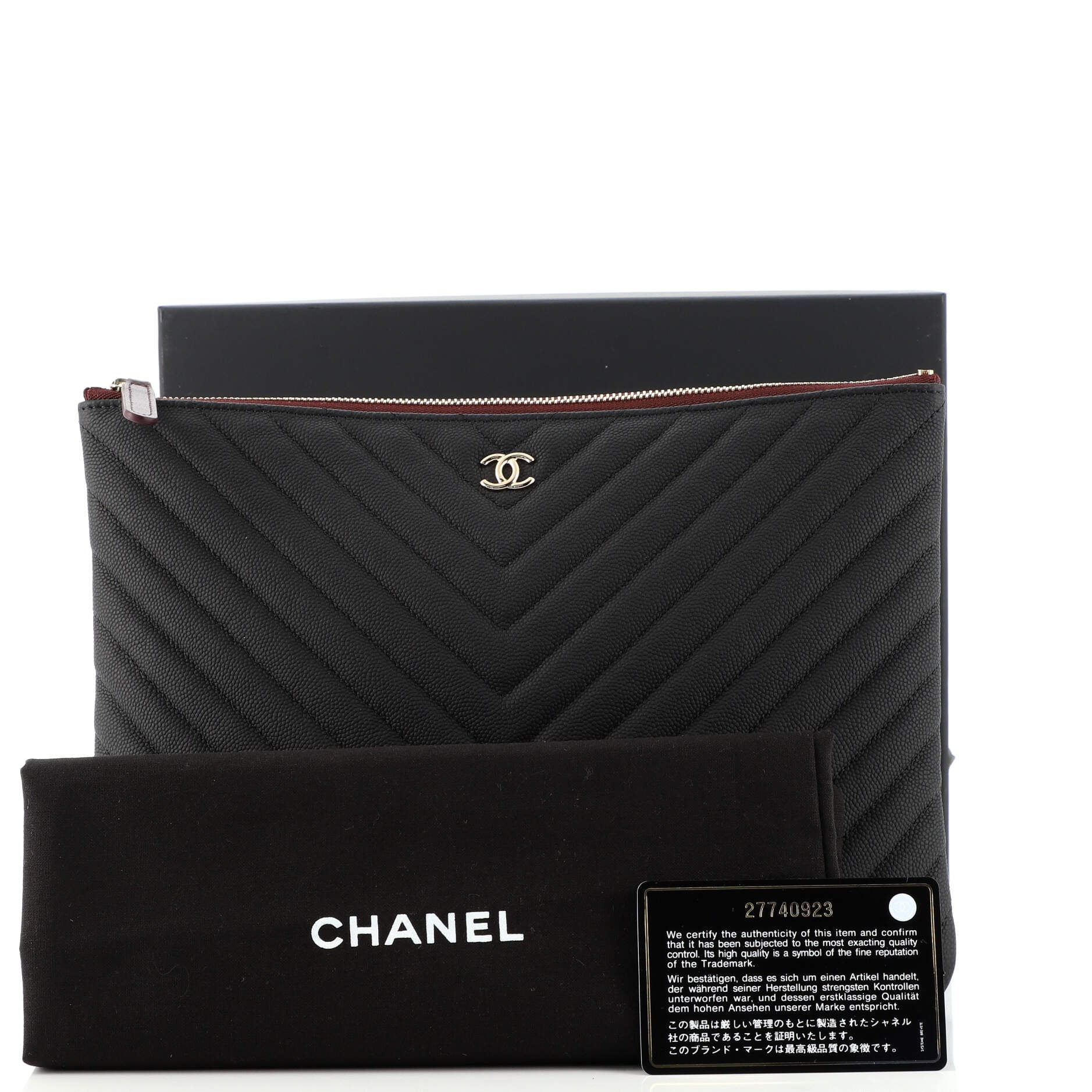 O Case Clutch Chevron Caviar Medium