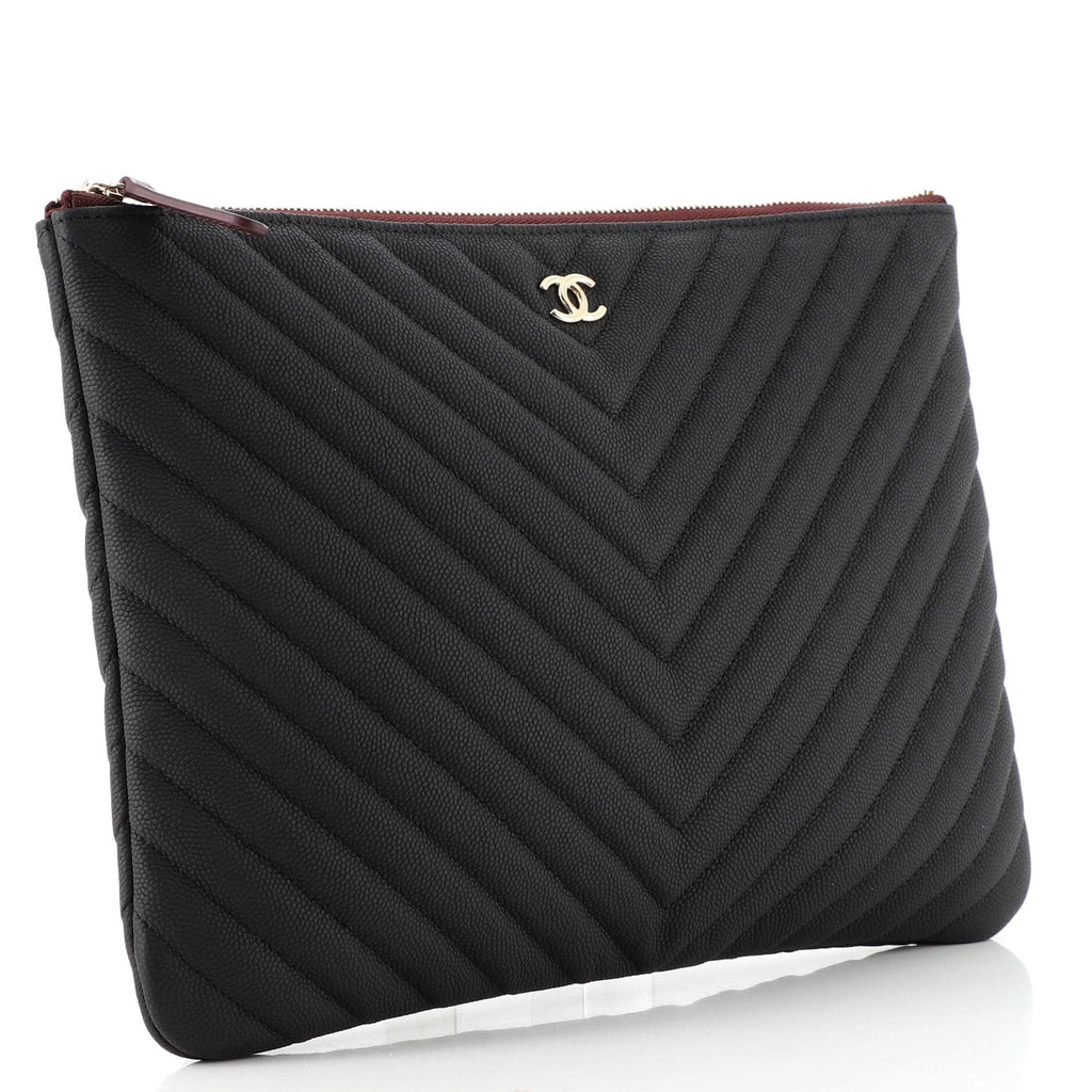 O Case Clutch Chevron Caviar Medium