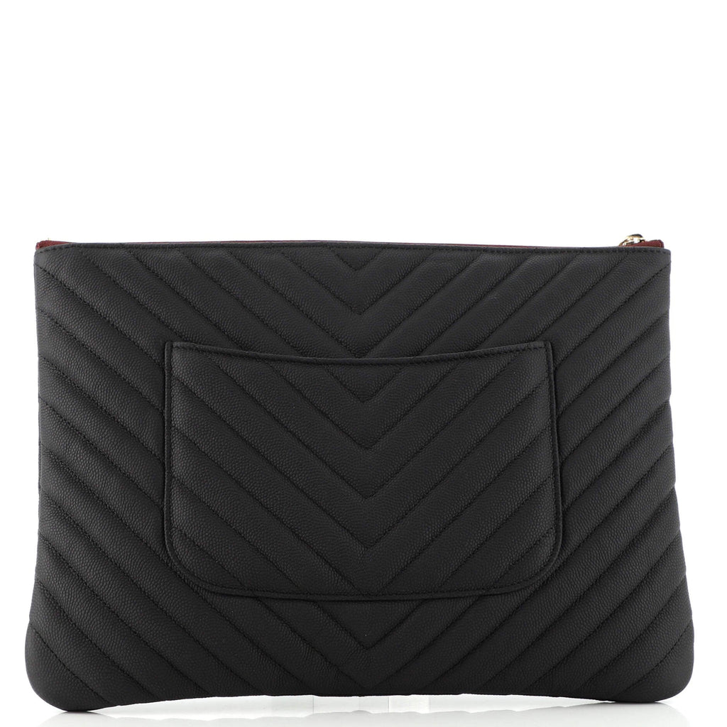 O Case Clutch Chevron Caviar Medium