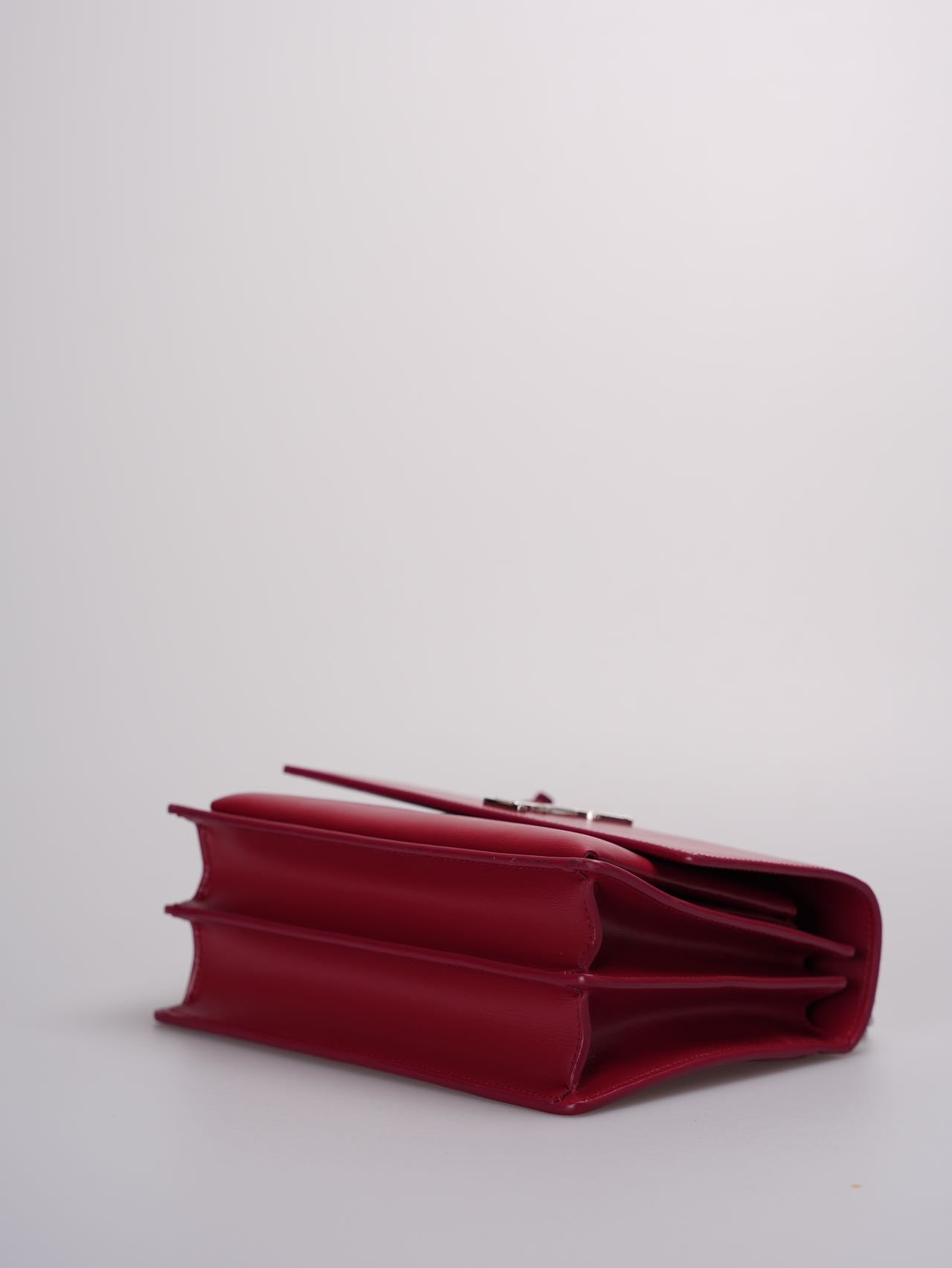 Saint Laurent Calfskin Medium Monogram Sunset shoulder bag in Rouge