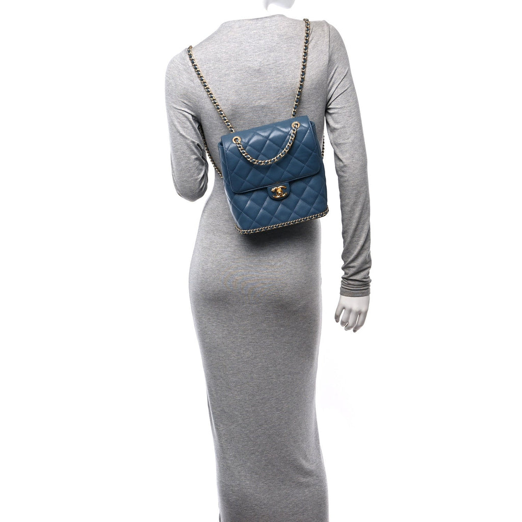 Caviar Quilted Camellia Chain Around Backpack Blue