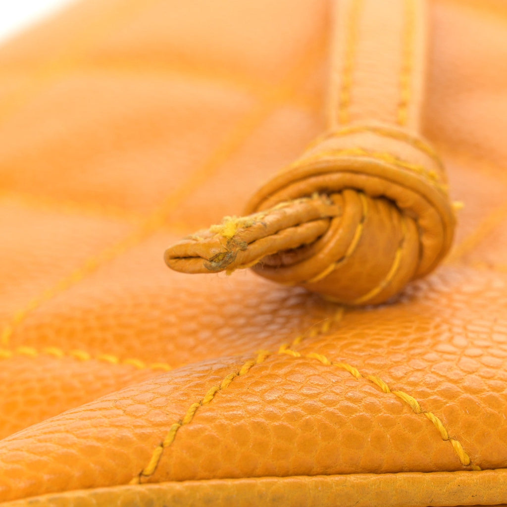 Caviar Quilted Drawstring Backpack Yellow