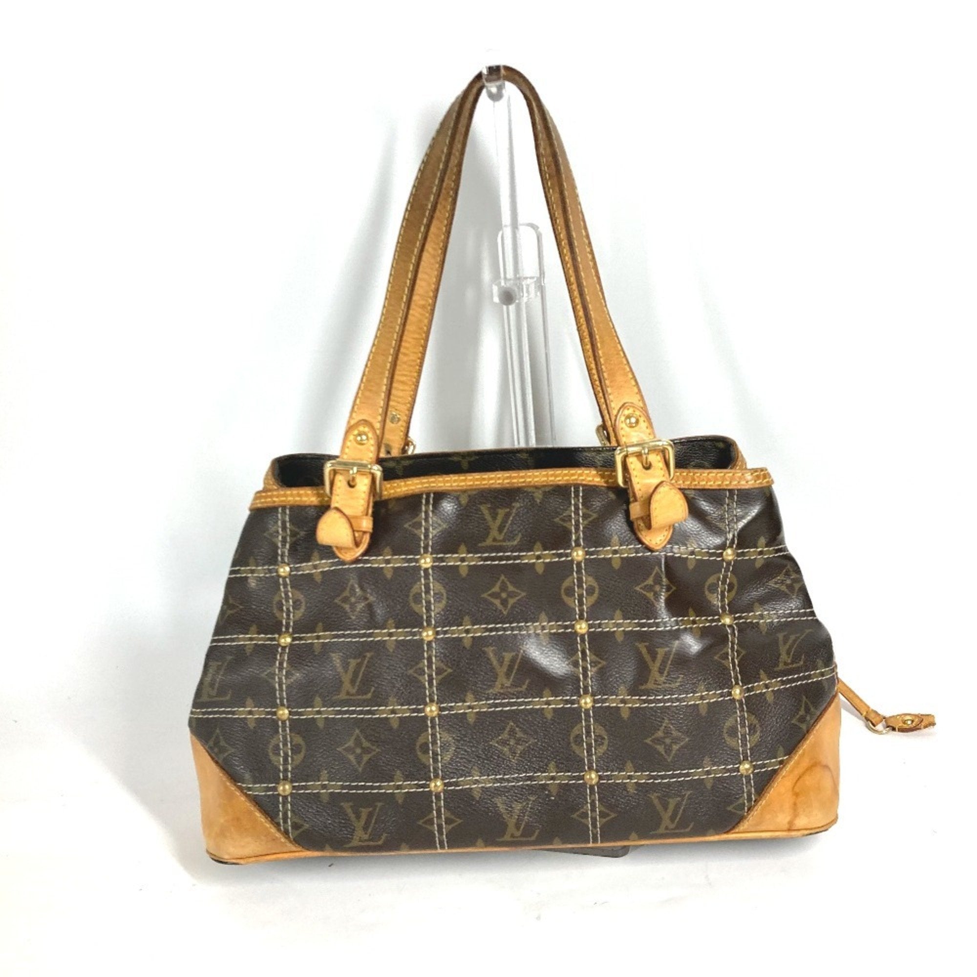 Riveting Handbag Monogram Canvas