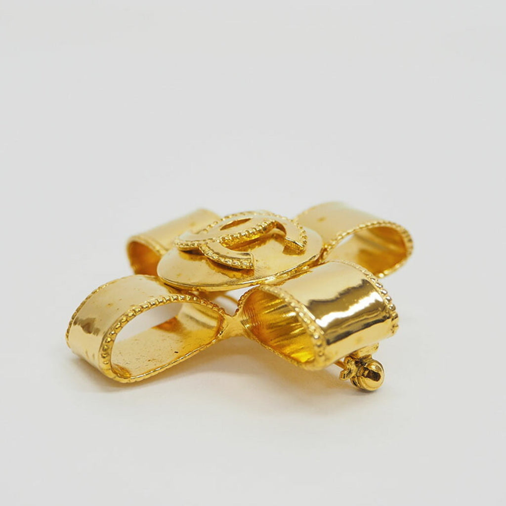 CC Logo Cross Brooch Gold-Tone Metal