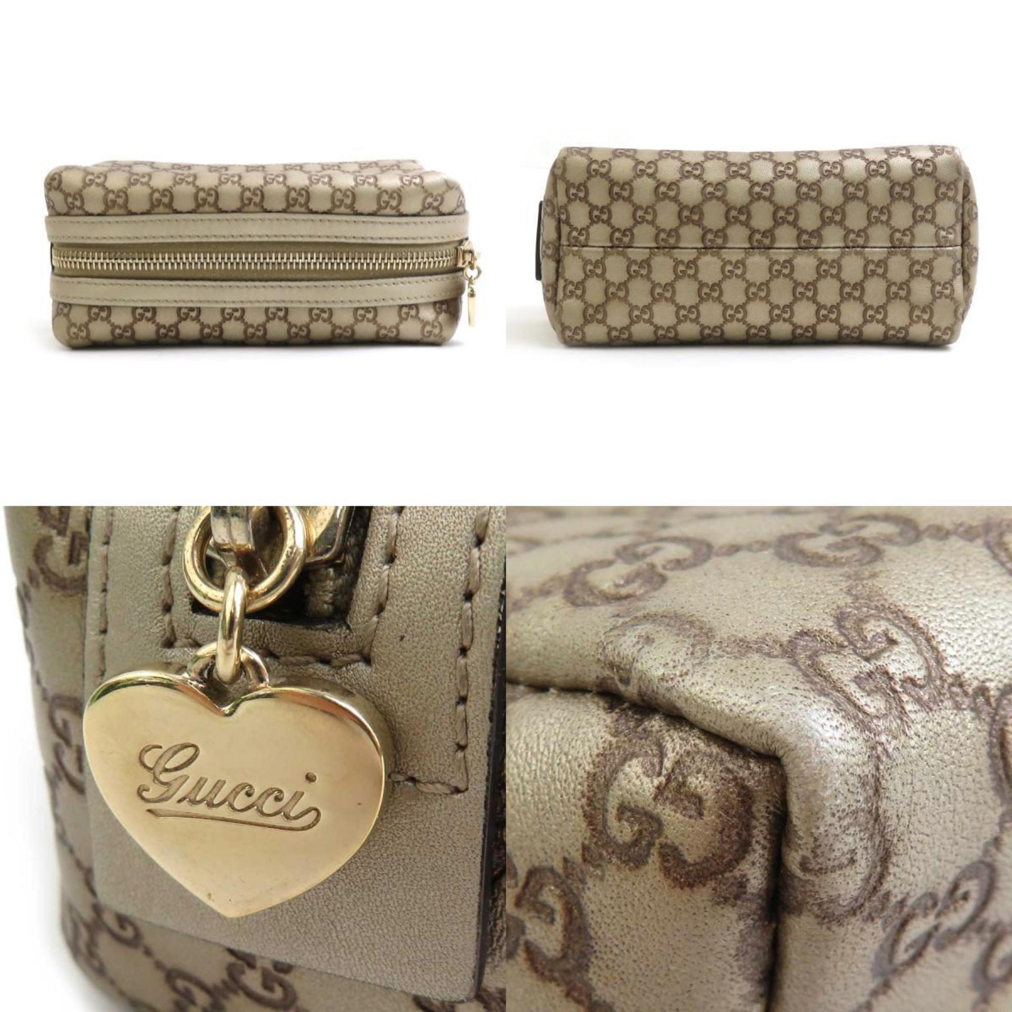 Wristlet Clutch Guccissima Leather