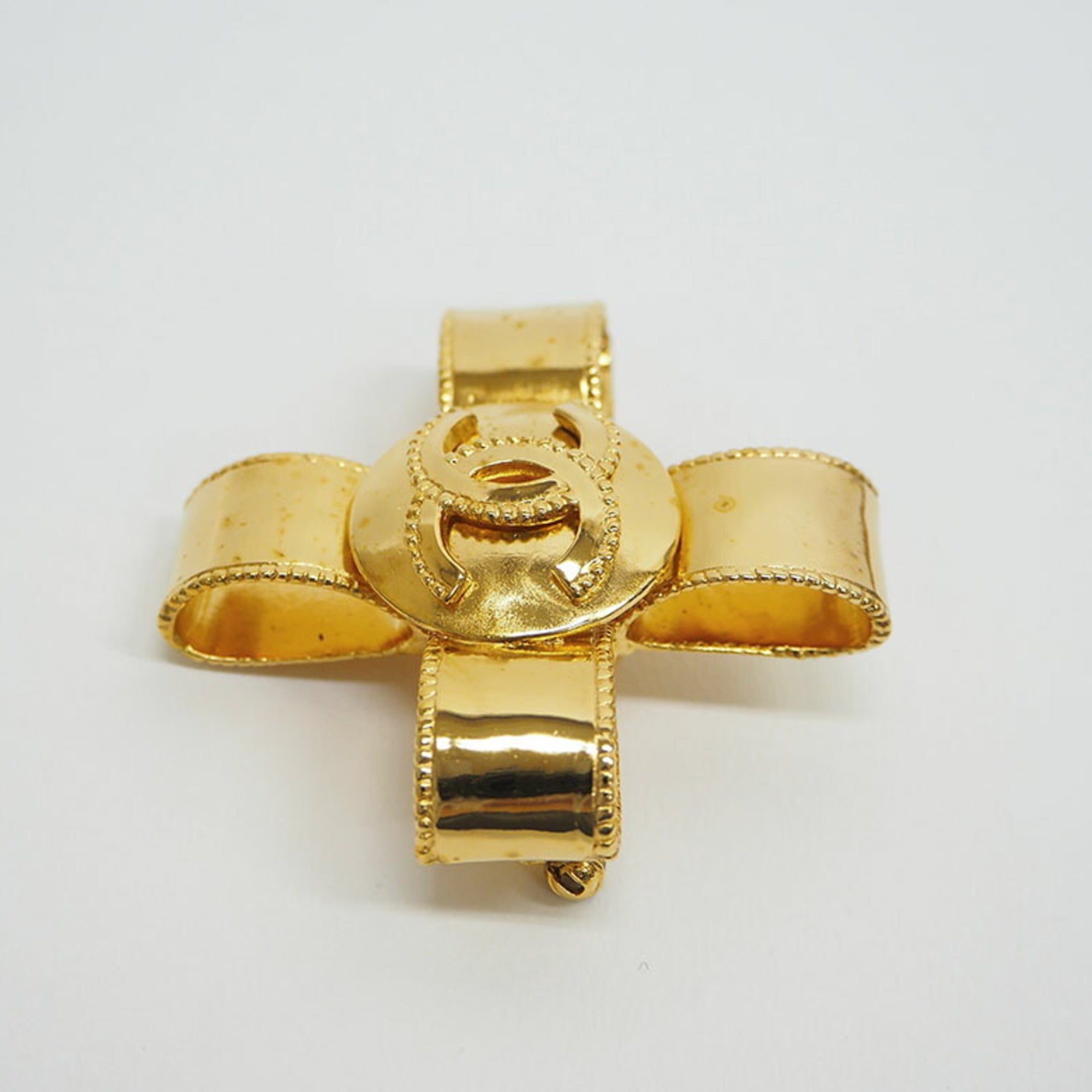 CC Logo Cross Brooch Gold-Tone Metal