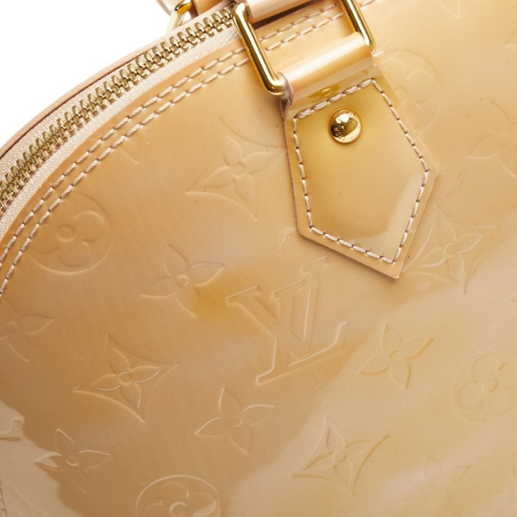Alma Handbag Monogram Vernis PM