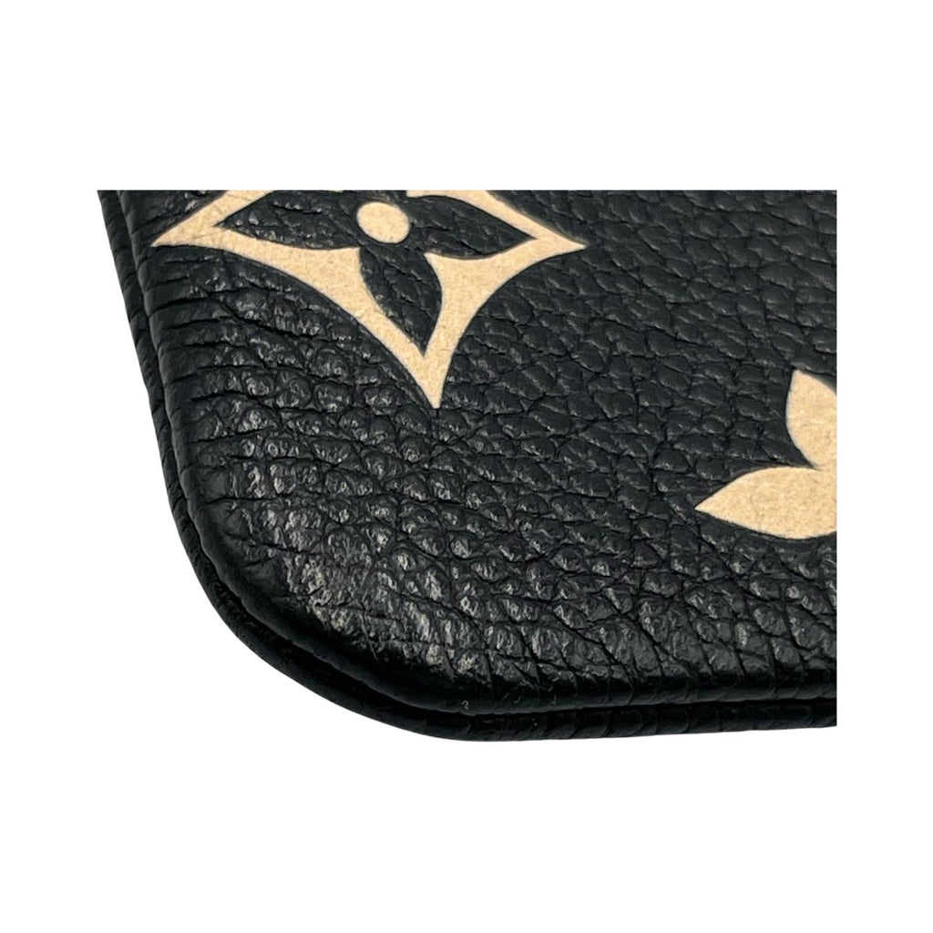 Pochette Accessoires Bicolor Monogram Empreinte Giant Mini