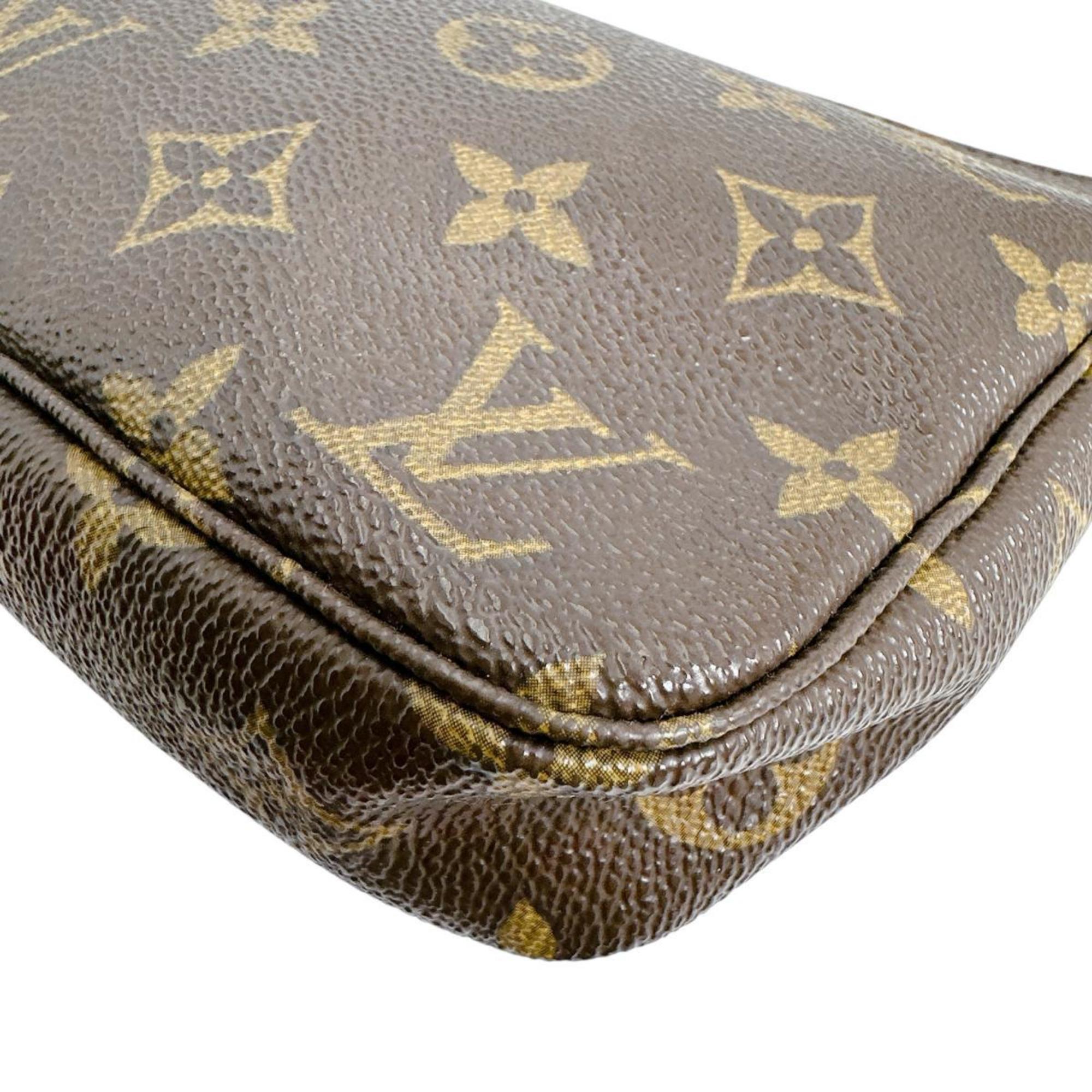 Pochette Accessoires Monogram Canvas