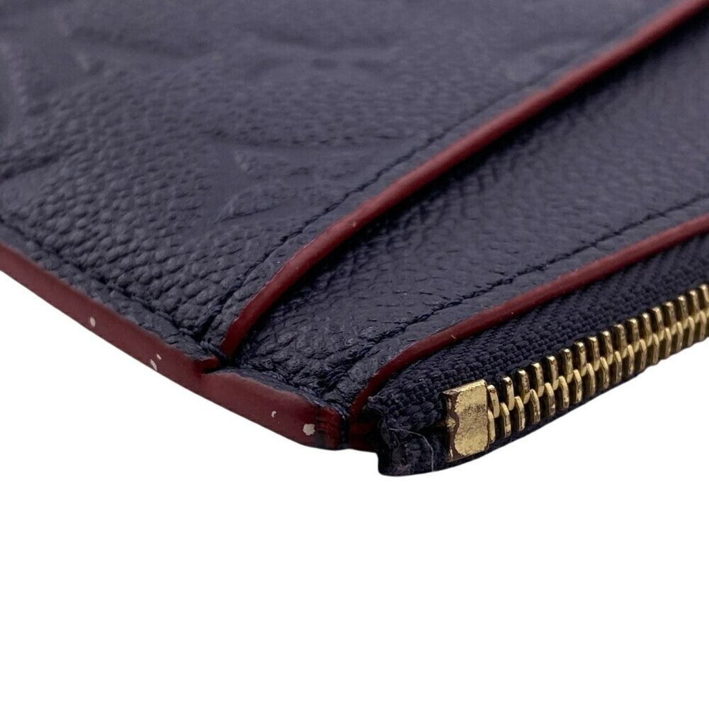 Pochette Melanie Monogram Empreinte Leather MM