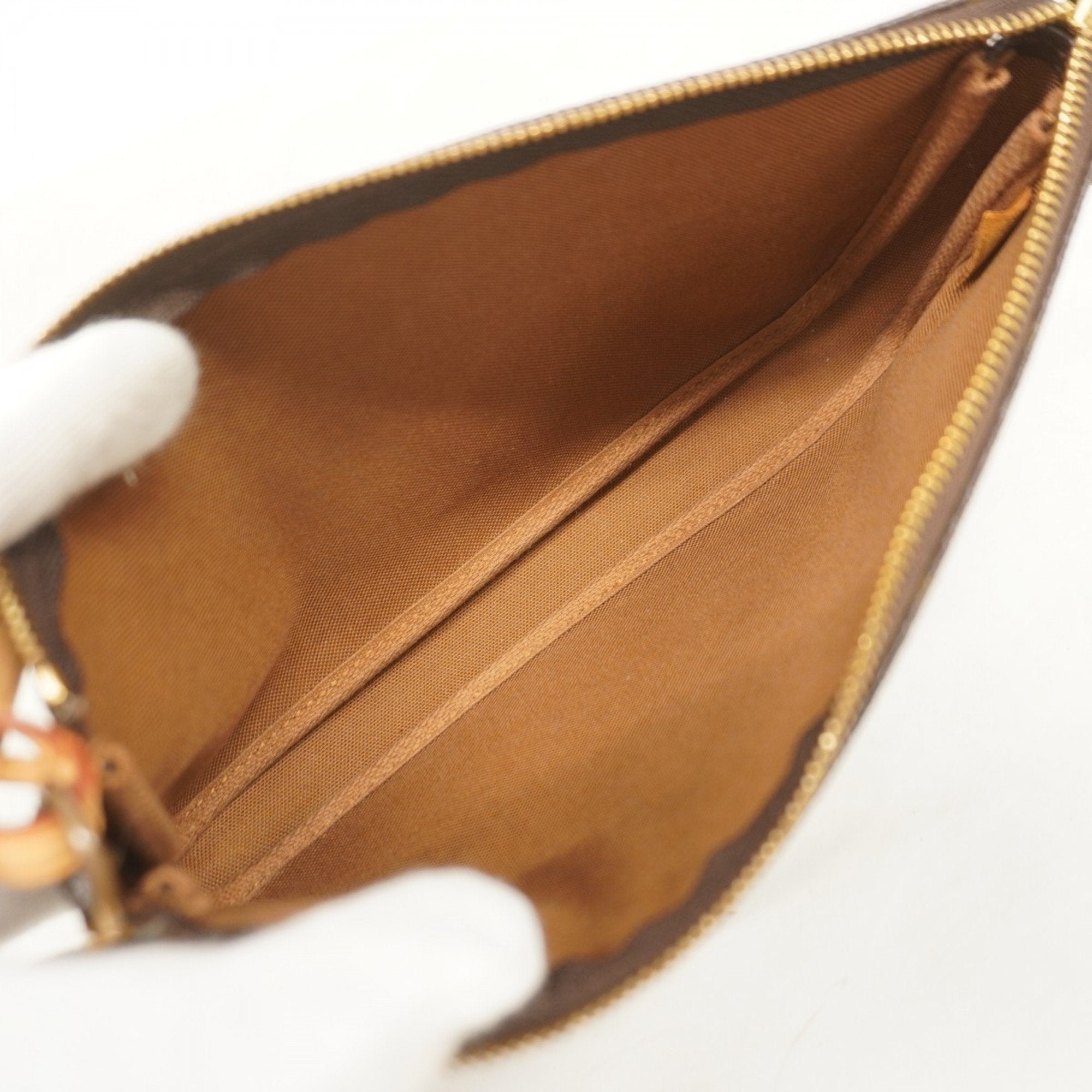 Pochette Accessoires Monogram Canvas