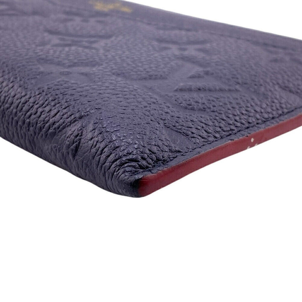 Pochette Melanie Monogram Empreinte Leather MM