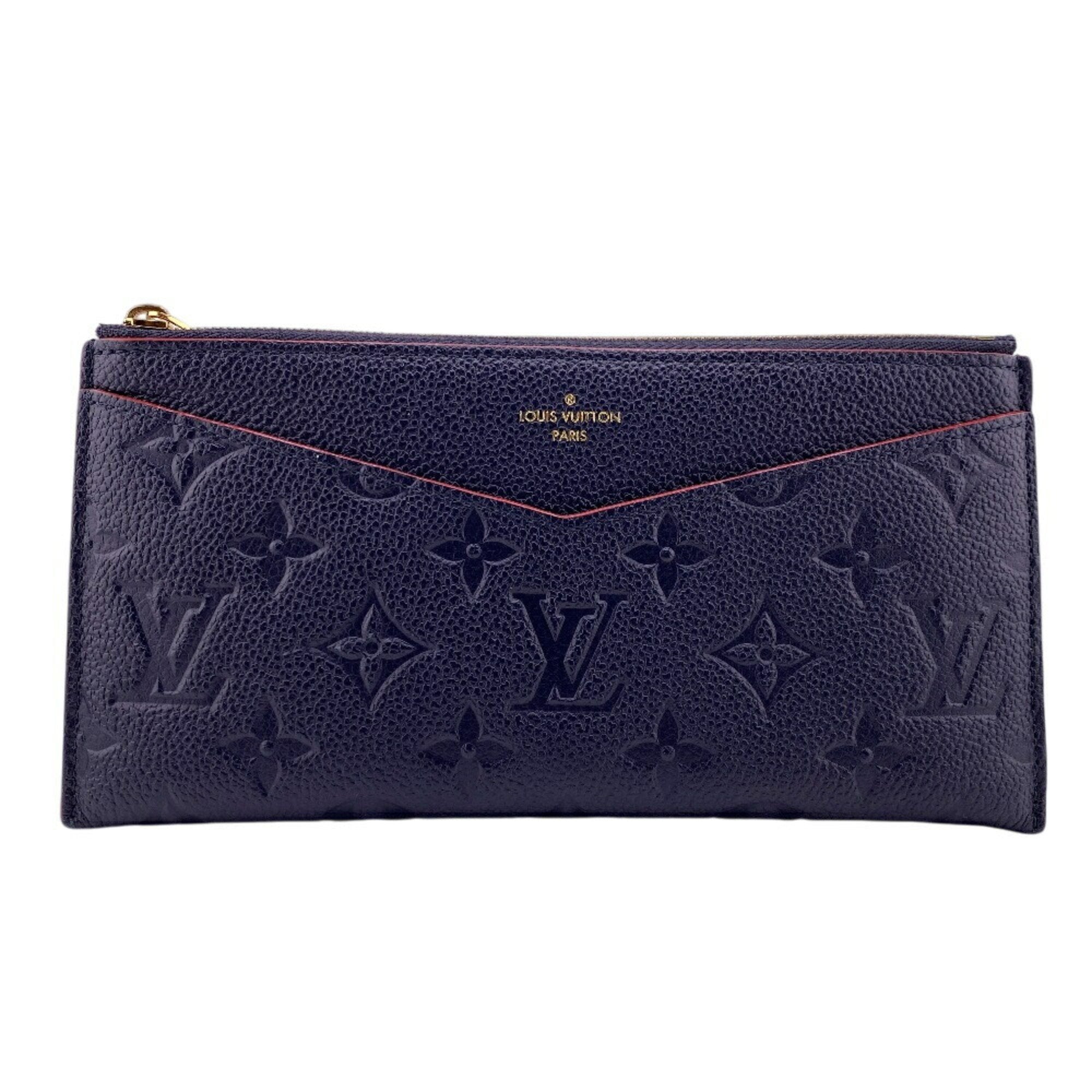 Pochette Melanie Monogram Empreinte Leather MM