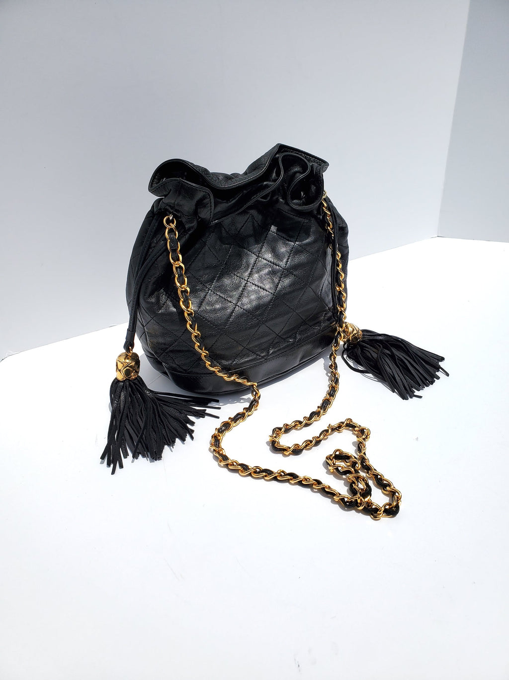 Vintage CHANEL 24k Gold Black Leather Quilted Bucket Bag